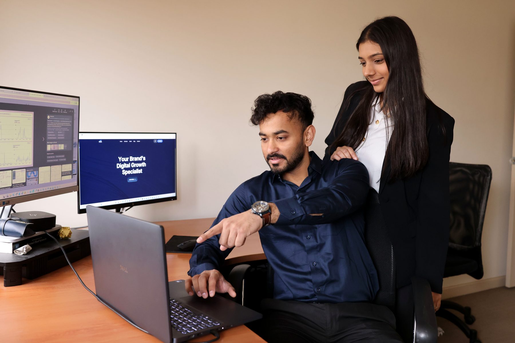 MSA Digital co-founders Aman and Shivangi Patel reviewing a client campaign