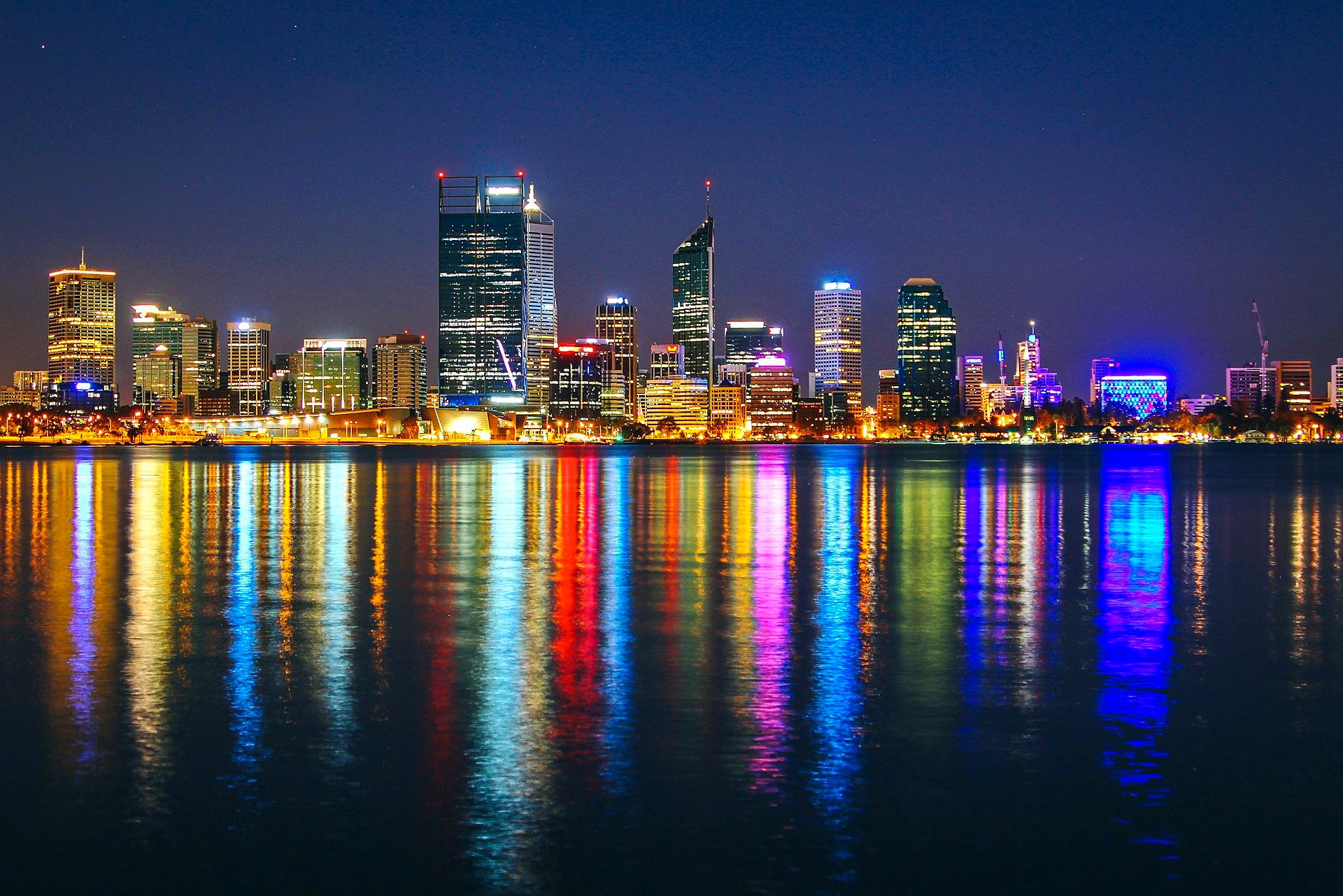 Perth CBD skyline reflected in the Swan River at night